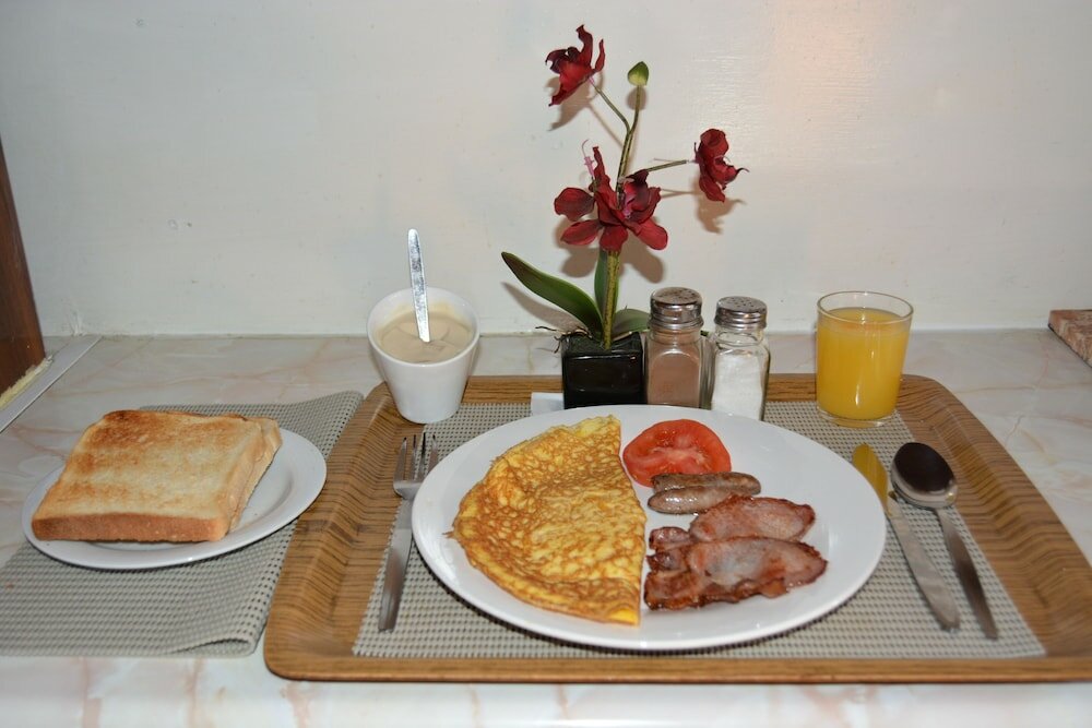 Фото The Swiss Guesthouse