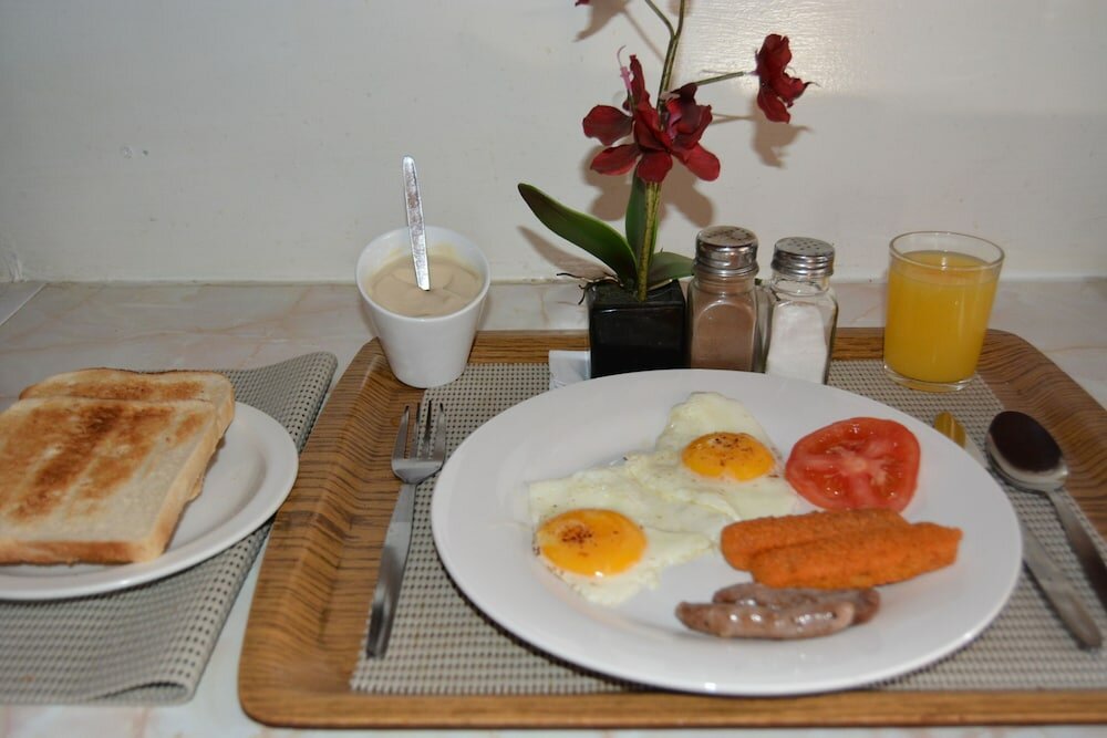 Фото The Swiss Guesthouse