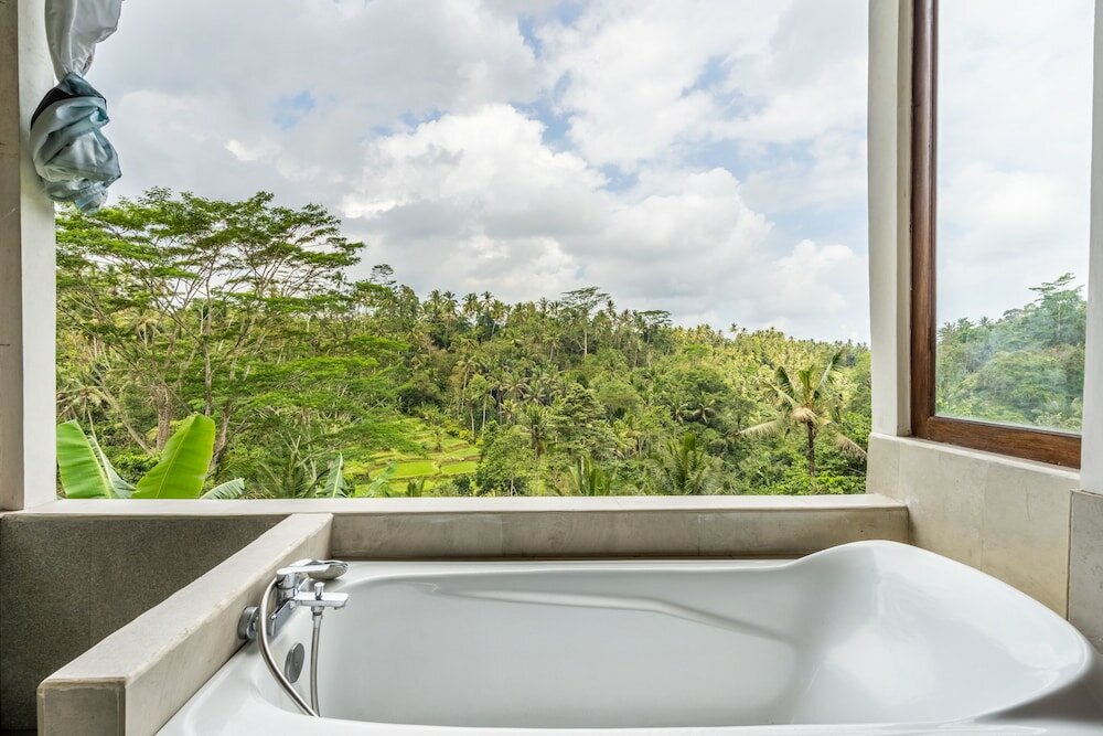 Фото Tirta Asri Ubud Villa