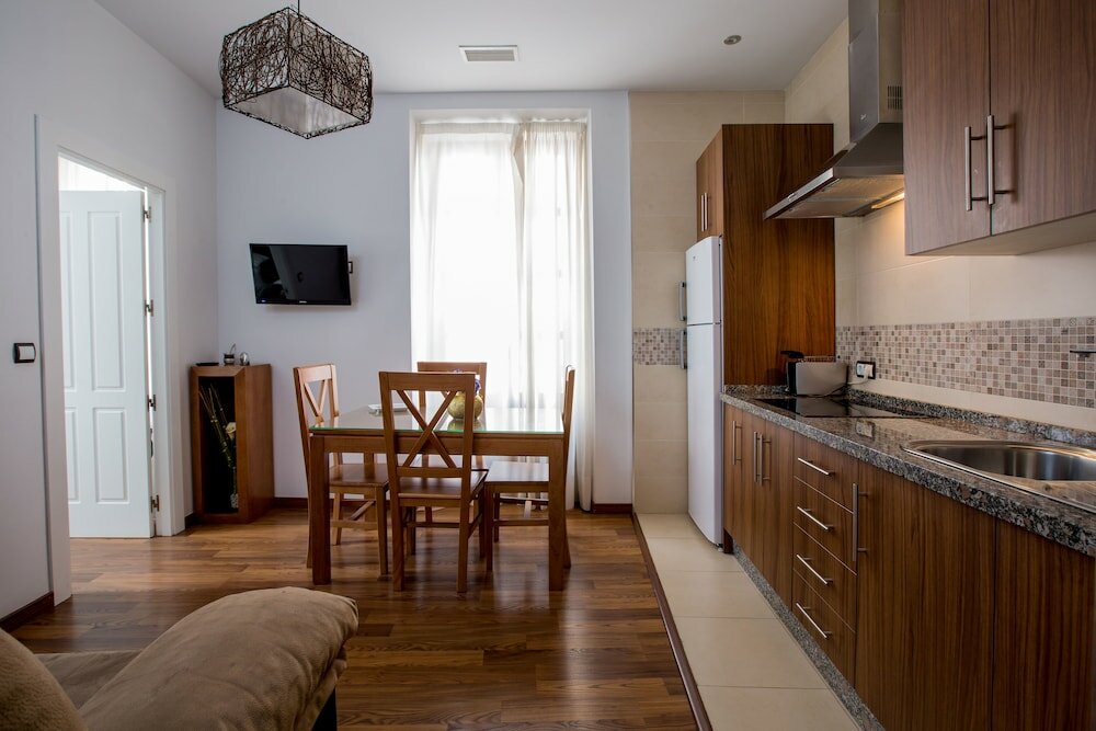 Фото Apartamentos Lonja del Marques