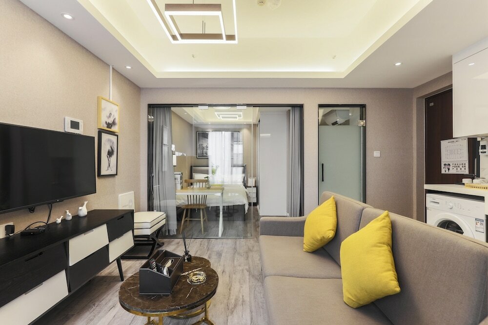 Фото Yue Qi Hotel Apartment