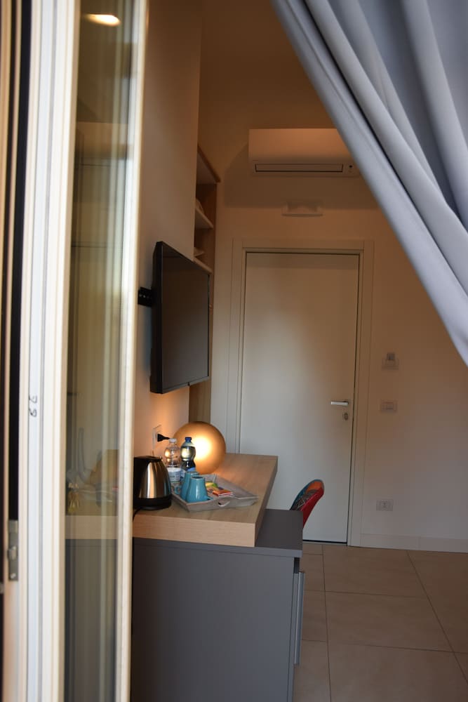 Фото Napoli Squares Suites