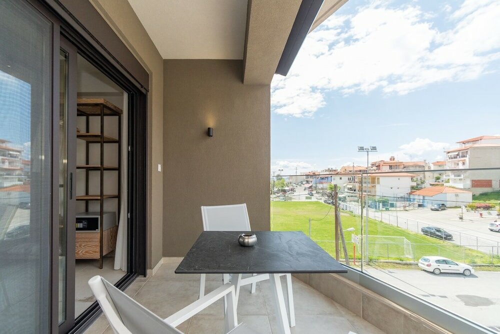 Фото Thetis Boutique Apartments