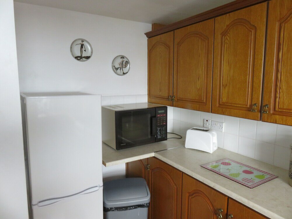 Фото The Coach House Self Catering Apartments