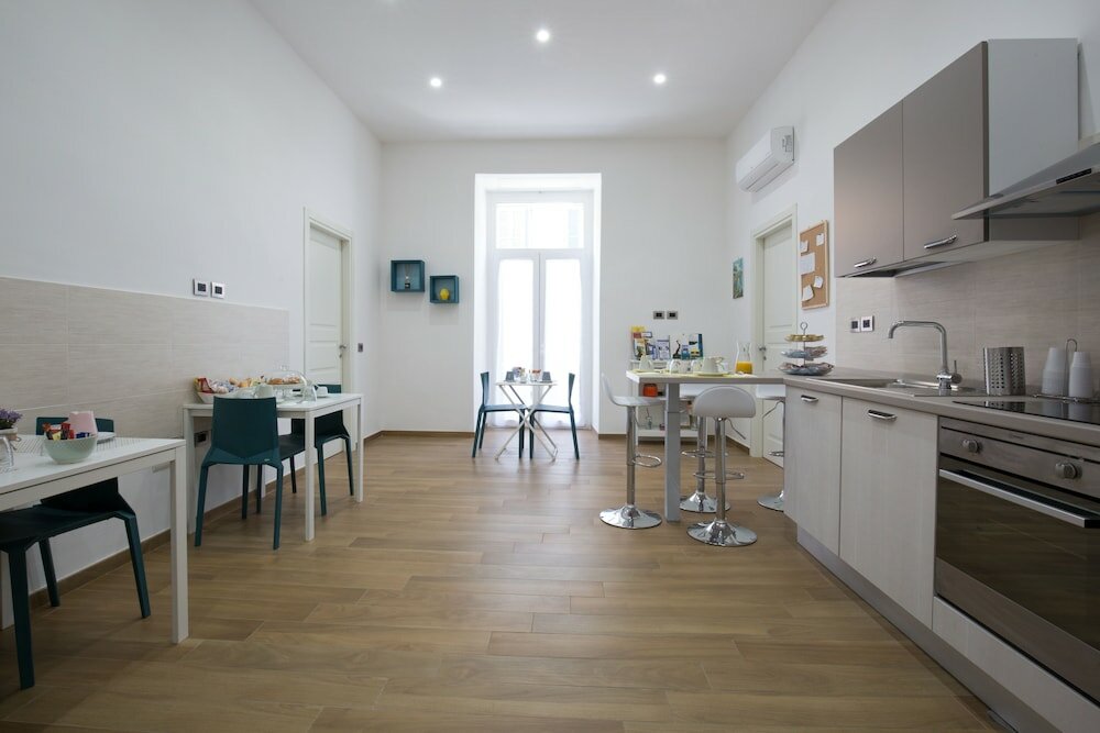 Фото Musto Suites & Rooms