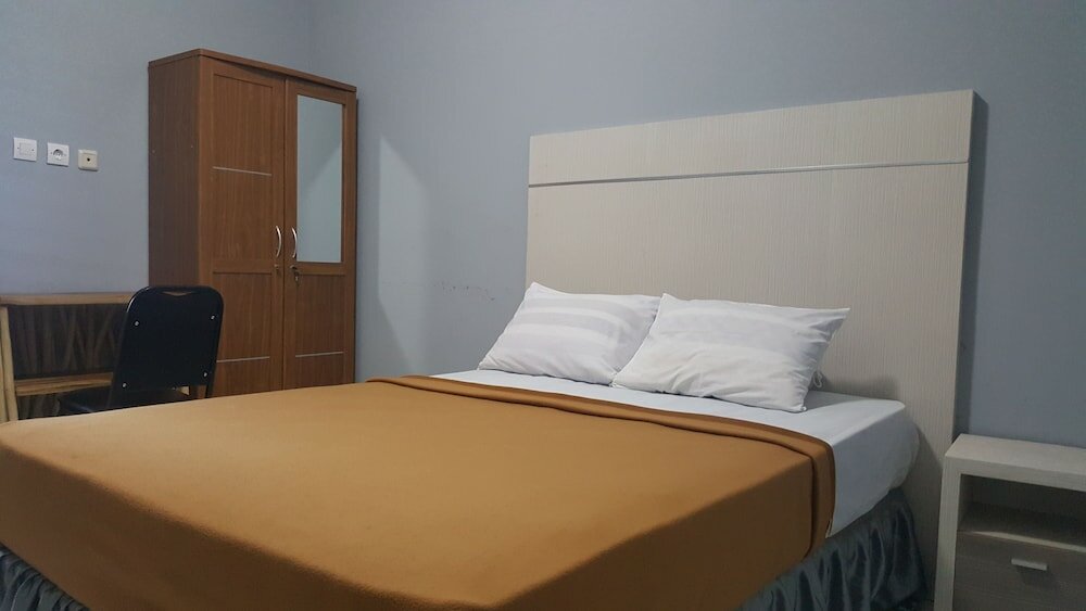 Фото Metro Malioboro Living