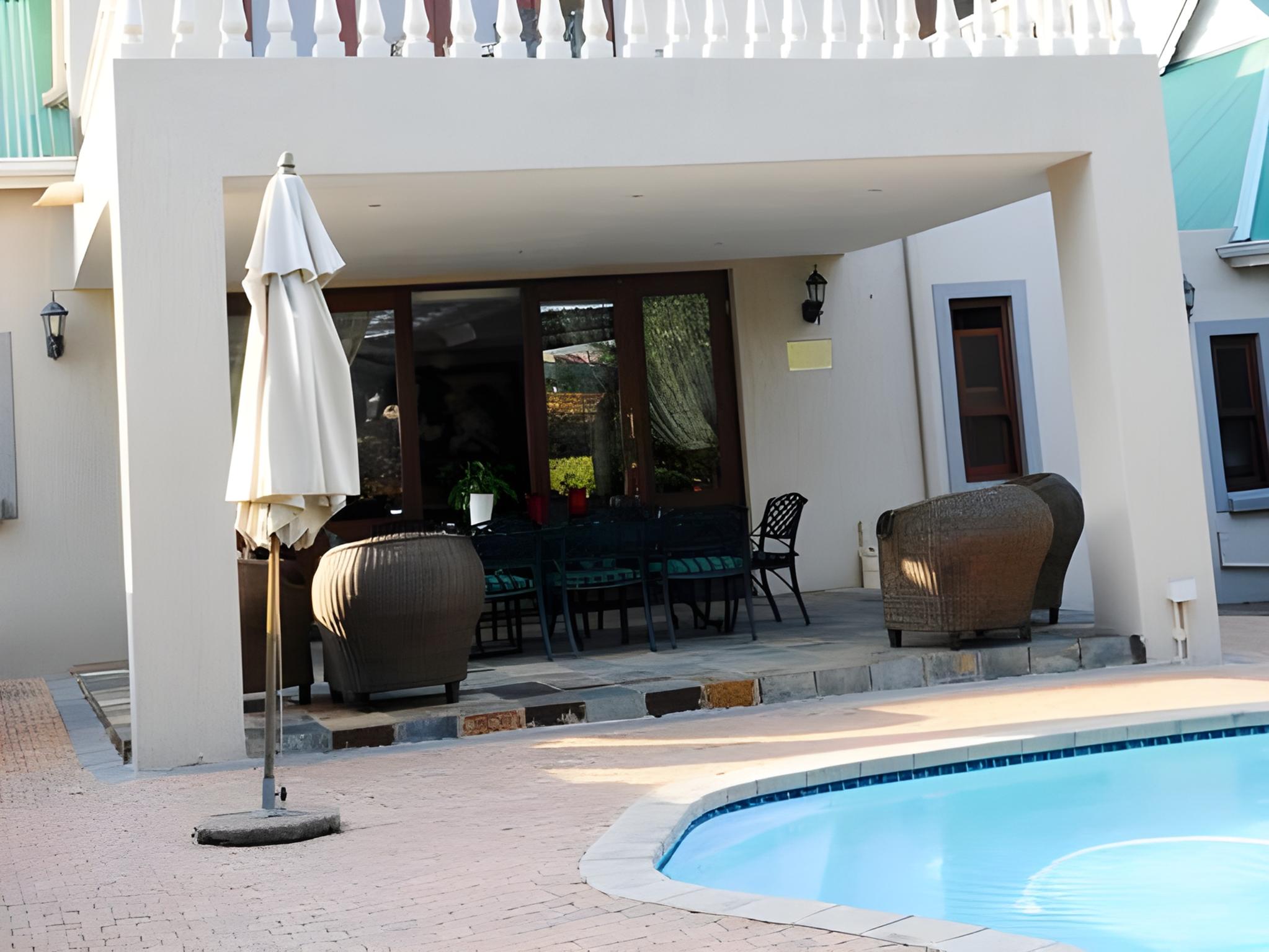 Фото Candlewoods Guesthouse