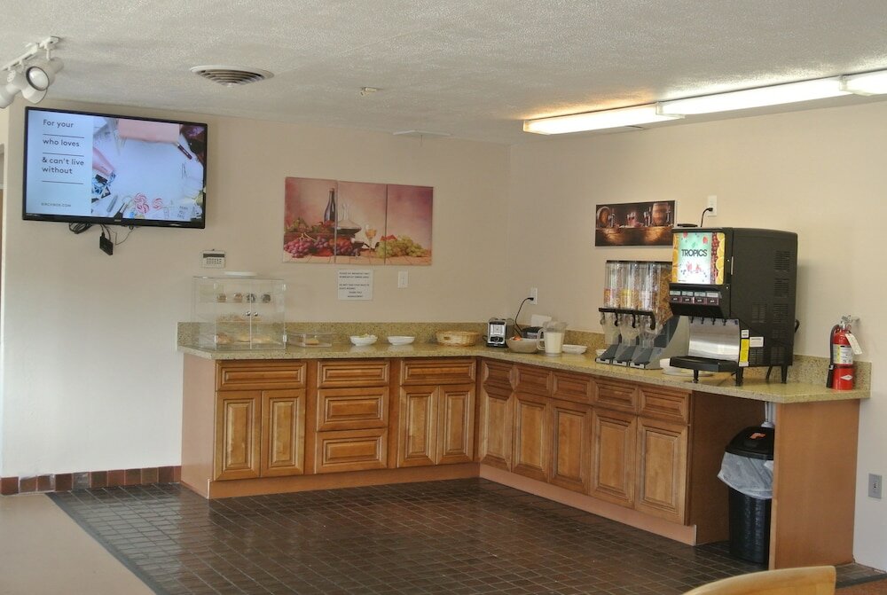 Фото Vino Inn & Suites