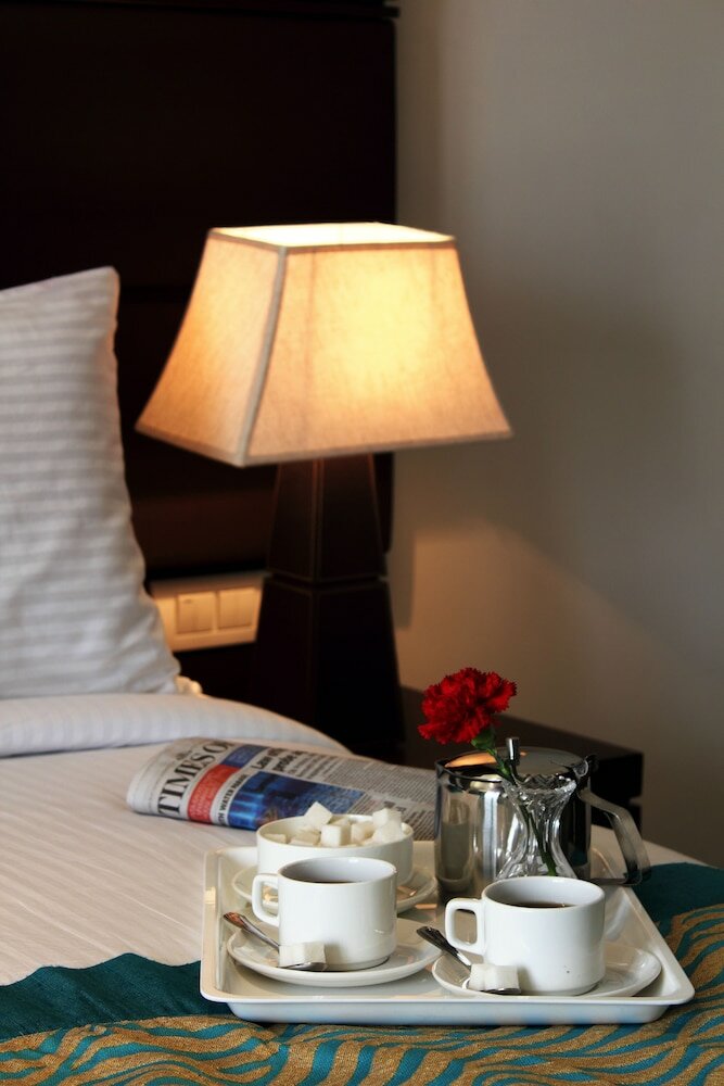 Фото Stately Suites MG Road