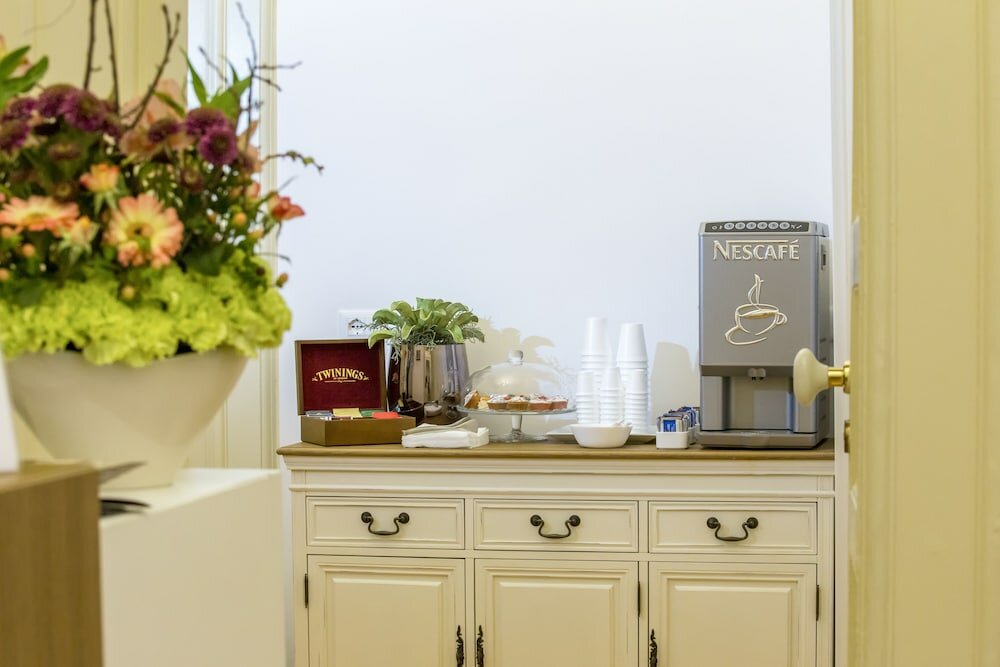 Фото Napoli Class Luxury Rooms & Suites