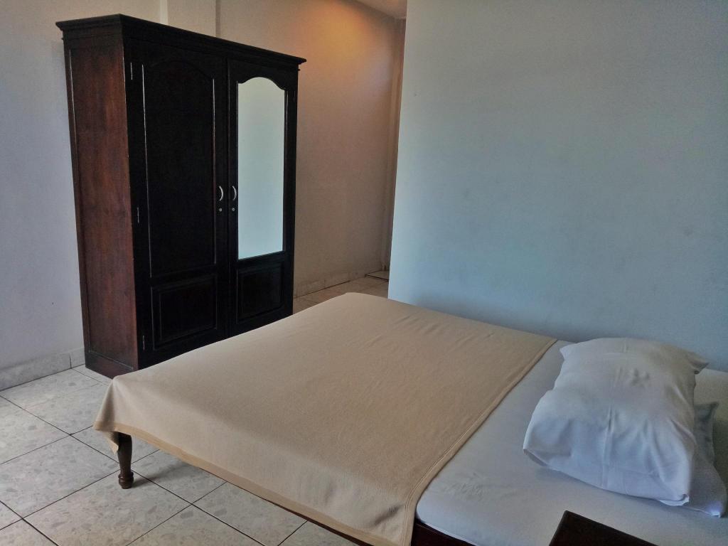 Фото Taman Mekar Beach Inn 2