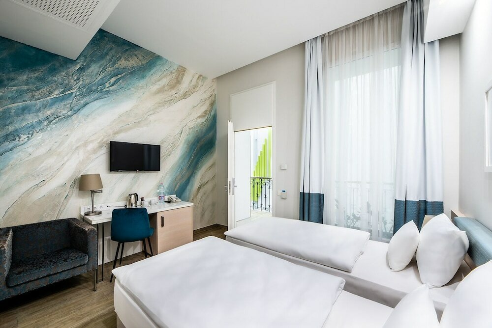 Фото Atrium Fashion Hotel