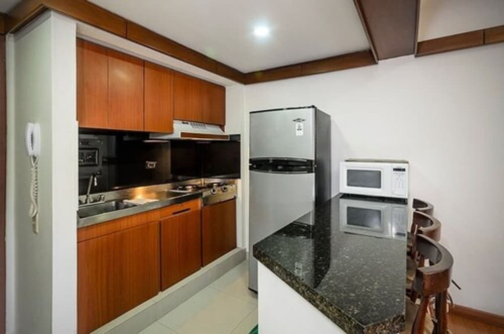 Фото Travelers Suites Condominio Plenitud