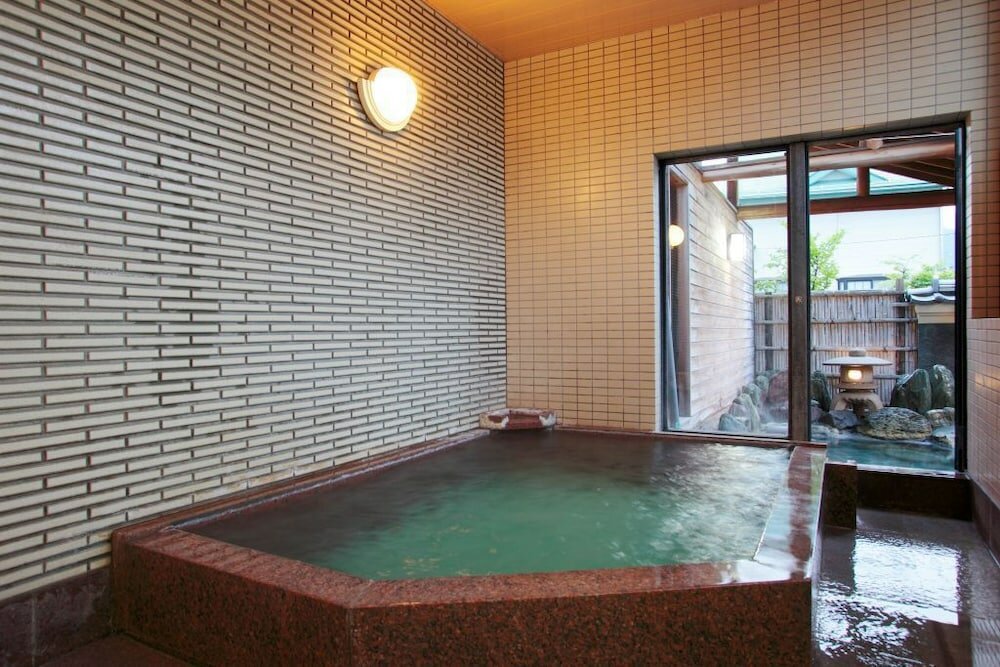 Фото Kusatsu Onsen Kiyoshigekan