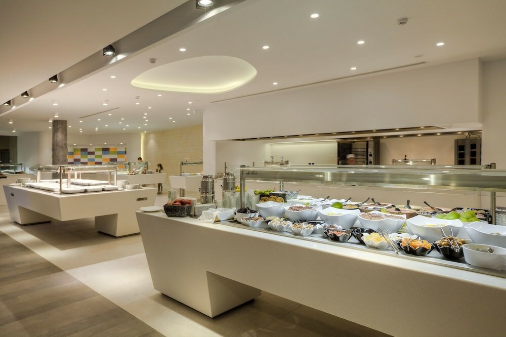 Фото Caravia Beach Hotel & Bungalows - All Inclusive