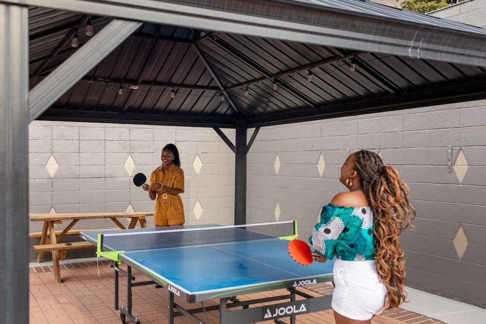 Фото Travelers Uptown Motel