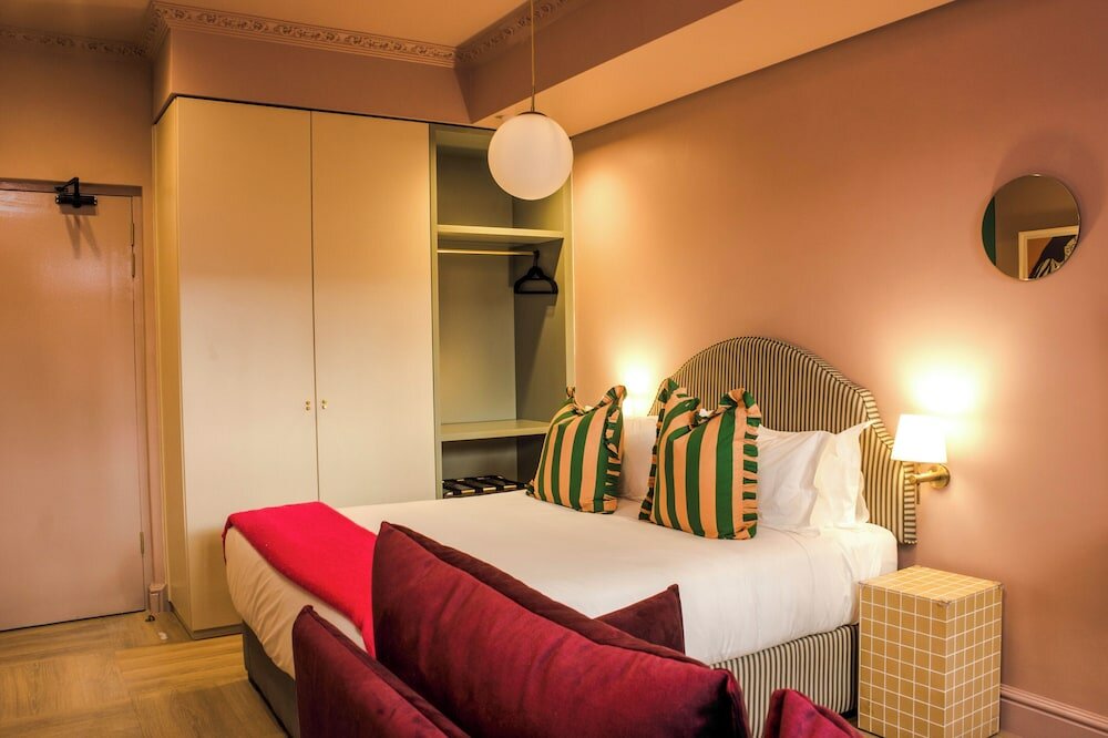 Фото The Trade Boutique Hotel