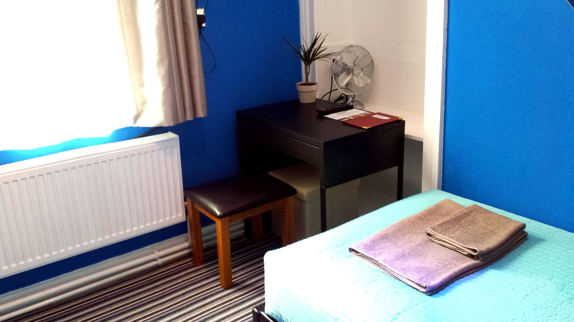 Фото Robin 7 Lodge City Centre