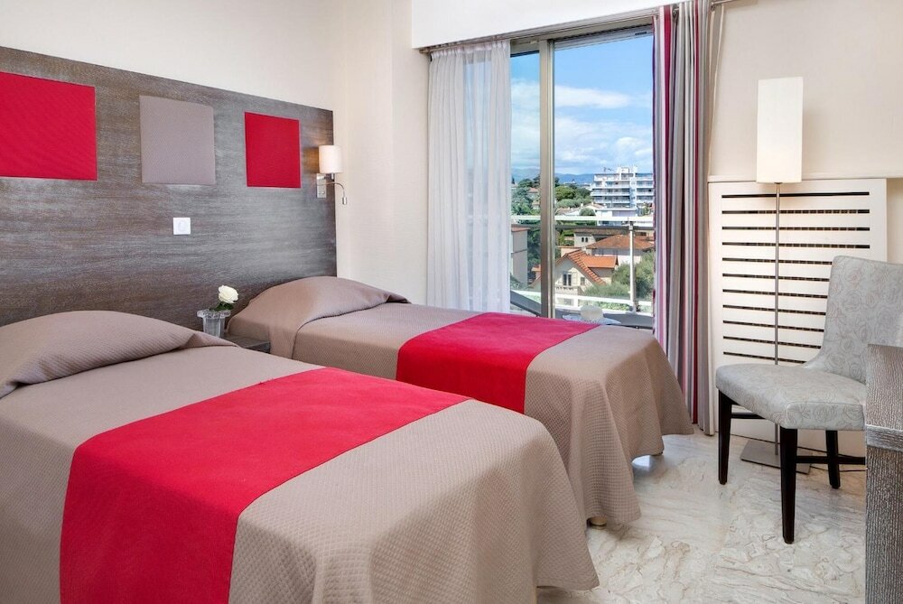 Фото The Originals Boutique, Hôtel Les Strélitzias, Antibes