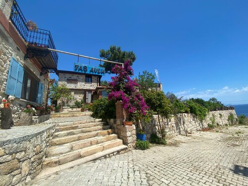 Гостиница Taş Avlu Butik Otel -karaburun в Карабуруне