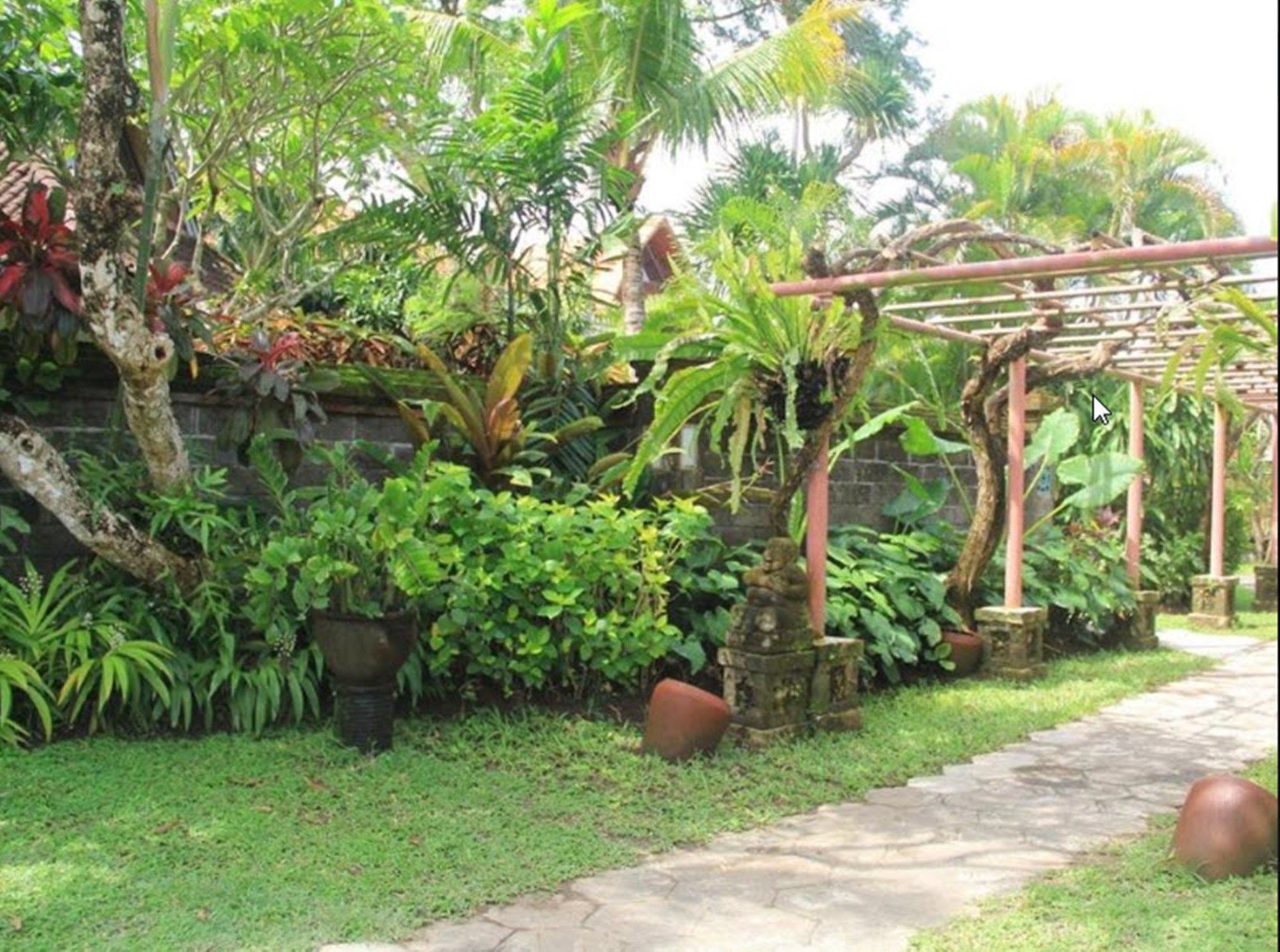 Фото Tandjung Sari Hotel