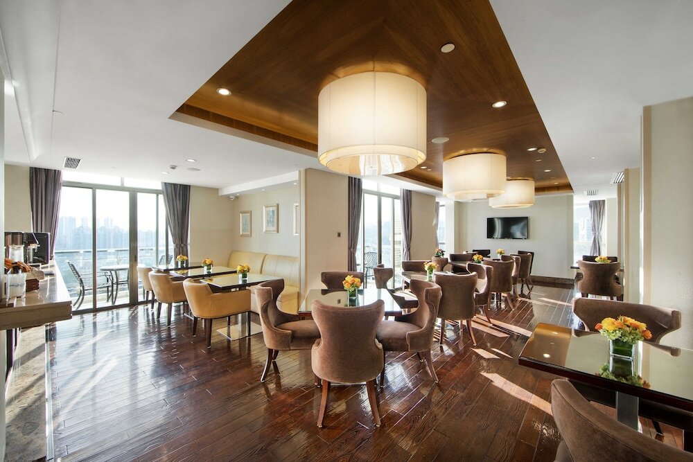 Фото Shenzhen New World Metro Grand Hotel