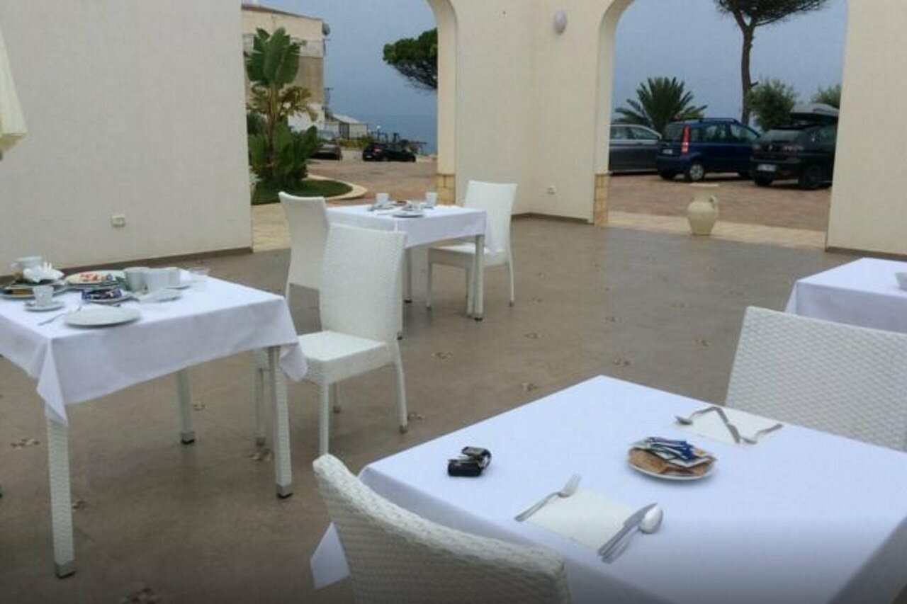 Фото Scala Dei Turchi Resort