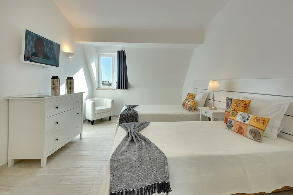 Фото Apartamentos Tucha