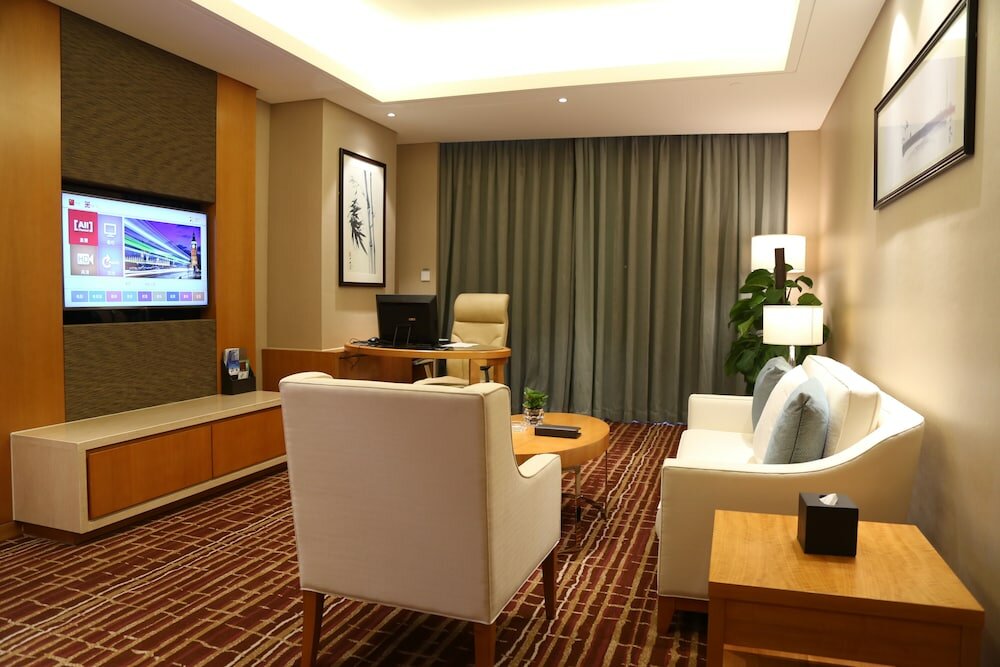 Фото Yiwu ShangCheng Hotel