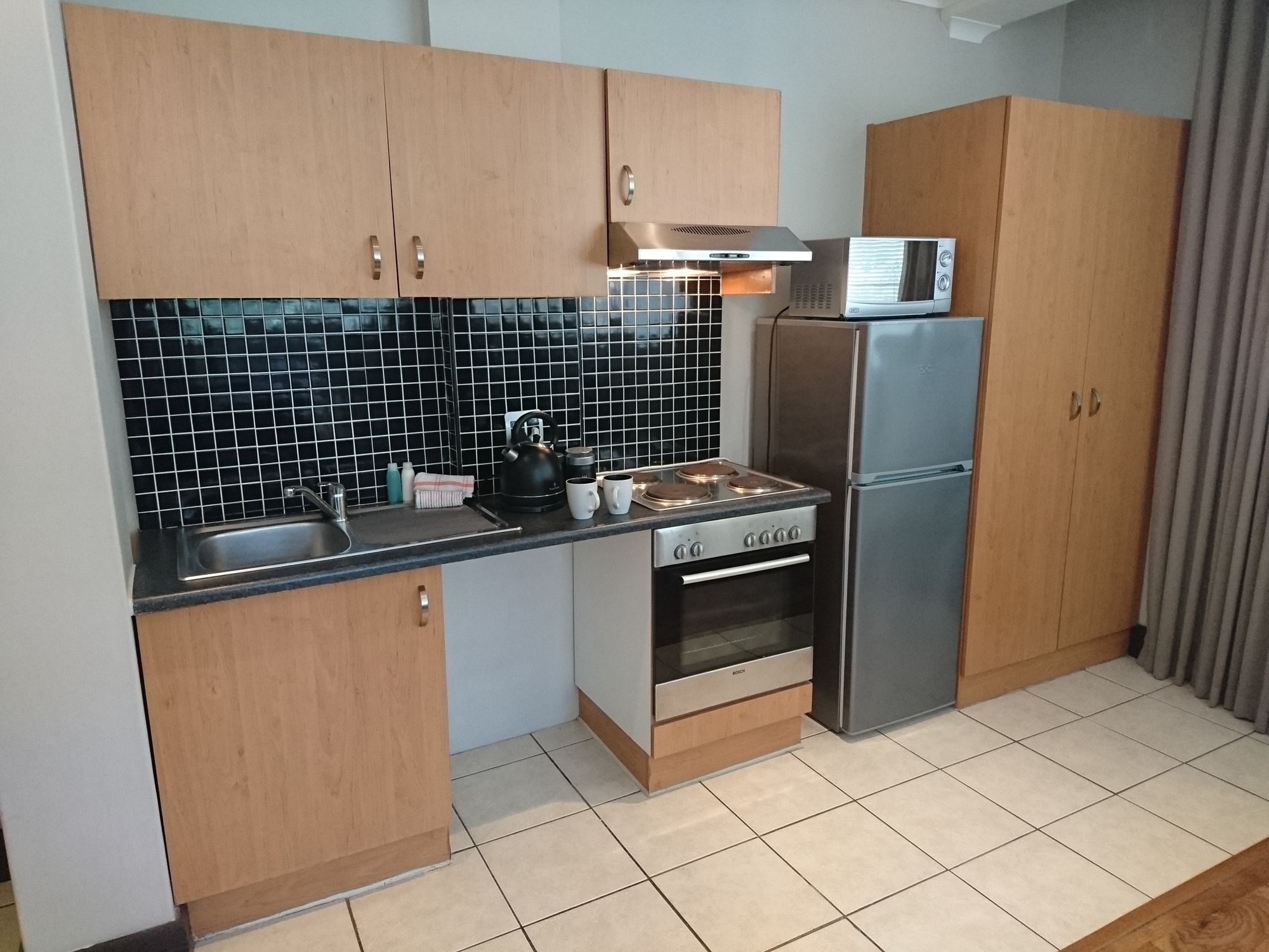 Фото The Square Apartments by Ctha