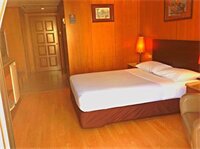 Фото Dynasty Inn Hotel