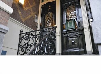 Фото Amsterdam Inn Hotel