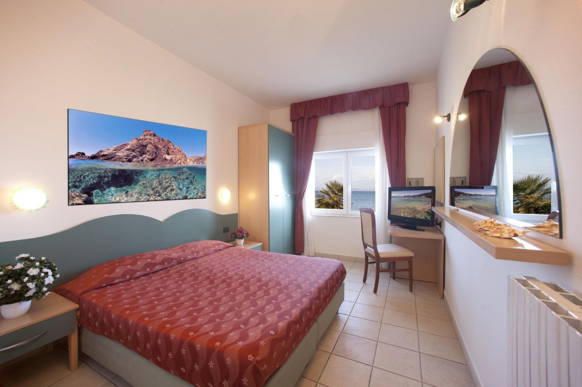 Фото Hotel La Caletta