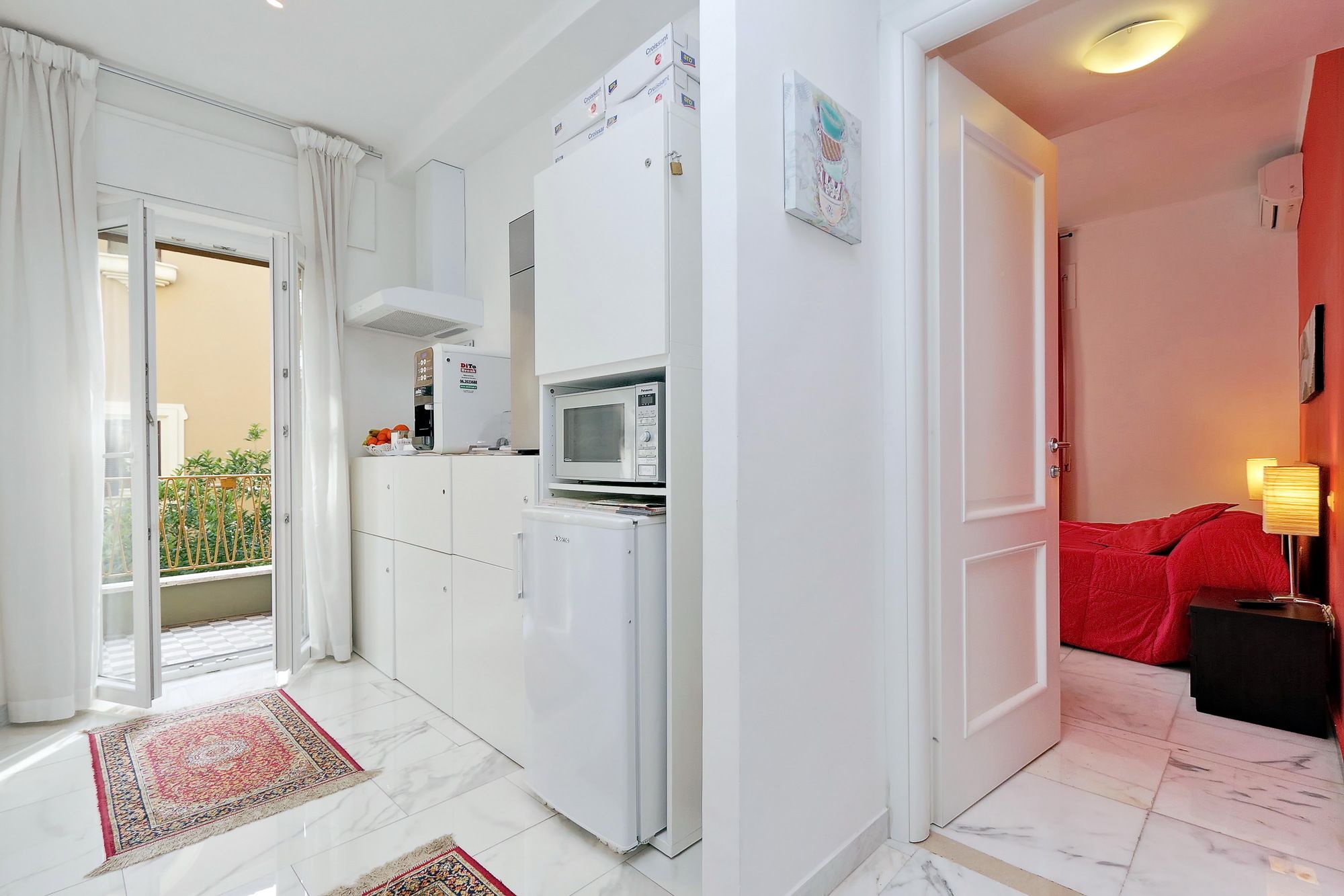 Фото  Pinidiroma Rooms and Suites