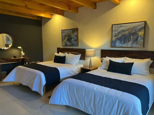 Гостиница Bosque Escondido Hotel de Montaña