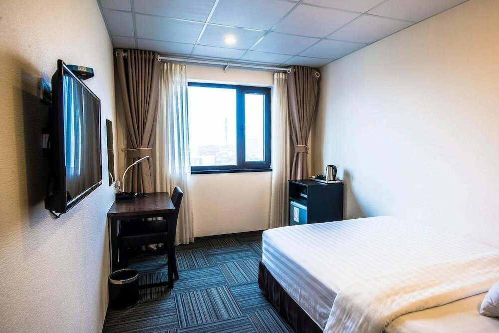 Фото Sakura Hotel 3