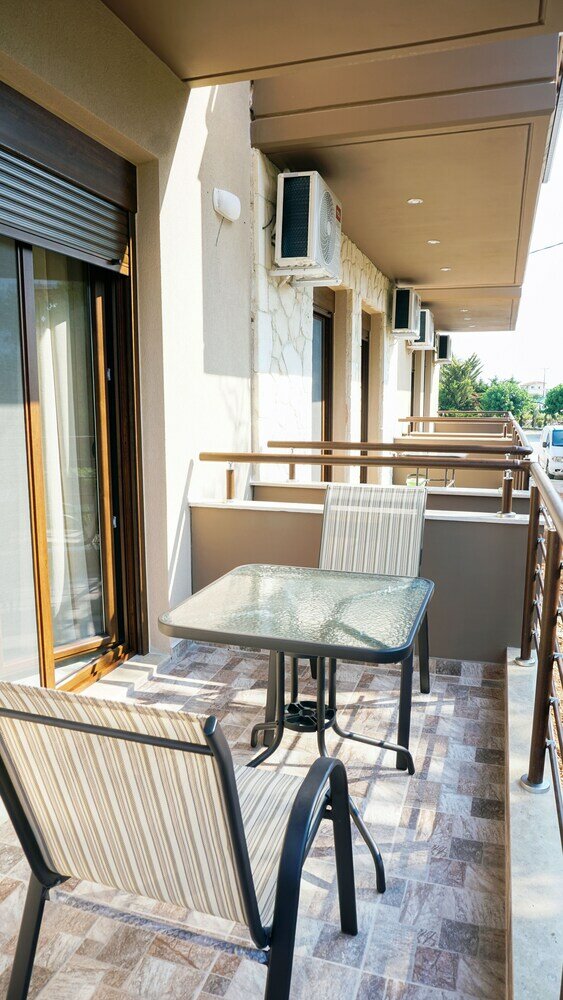 Фото Sinodinos Deluxe Apartments