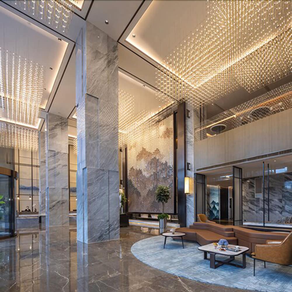 Фото New Century Hotel Zhenhai