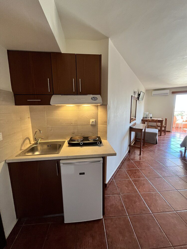 Фото Iolkos Hotel Apartments