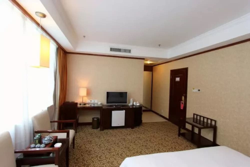 Фото Shenzhen Caiwuwei Hotel