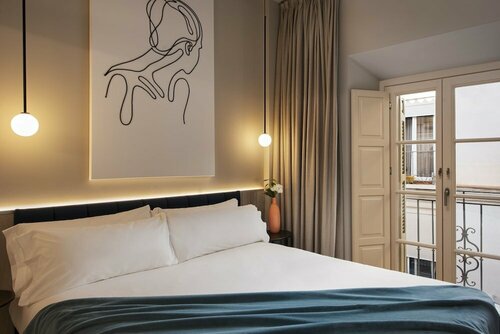 Гостиница Coeo  Peña Aparthotel в Малаге
