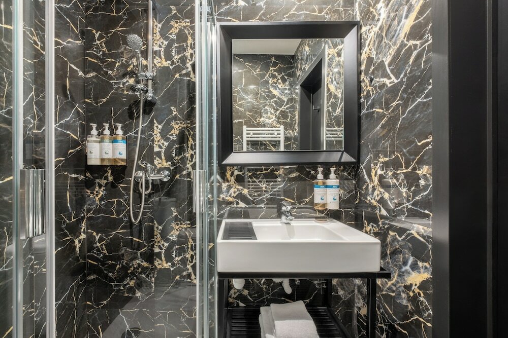 Фото Numa i Scoop Rooms & Apartments