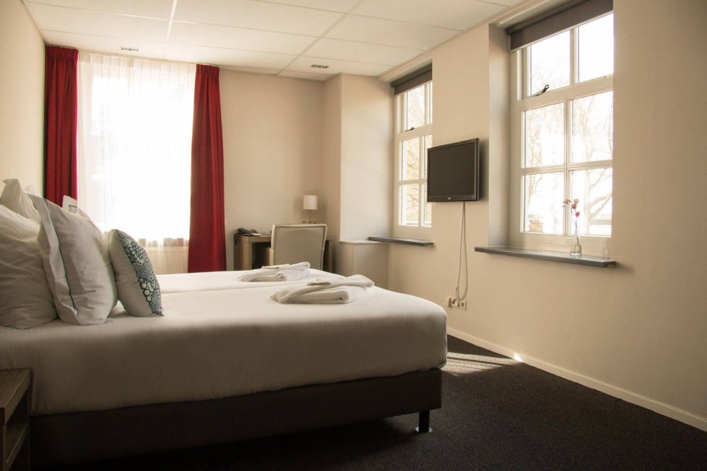 Фото Hotel De Koepoort Hotel