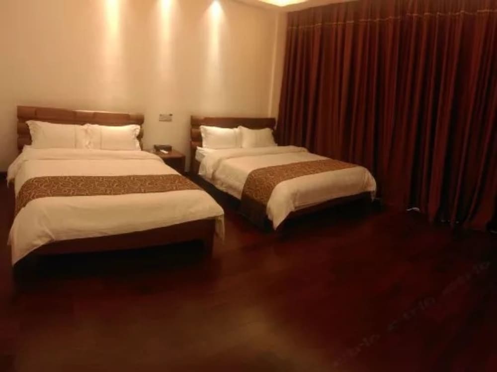 Фото Yumi Apartment-Quan Tian Xia Branch