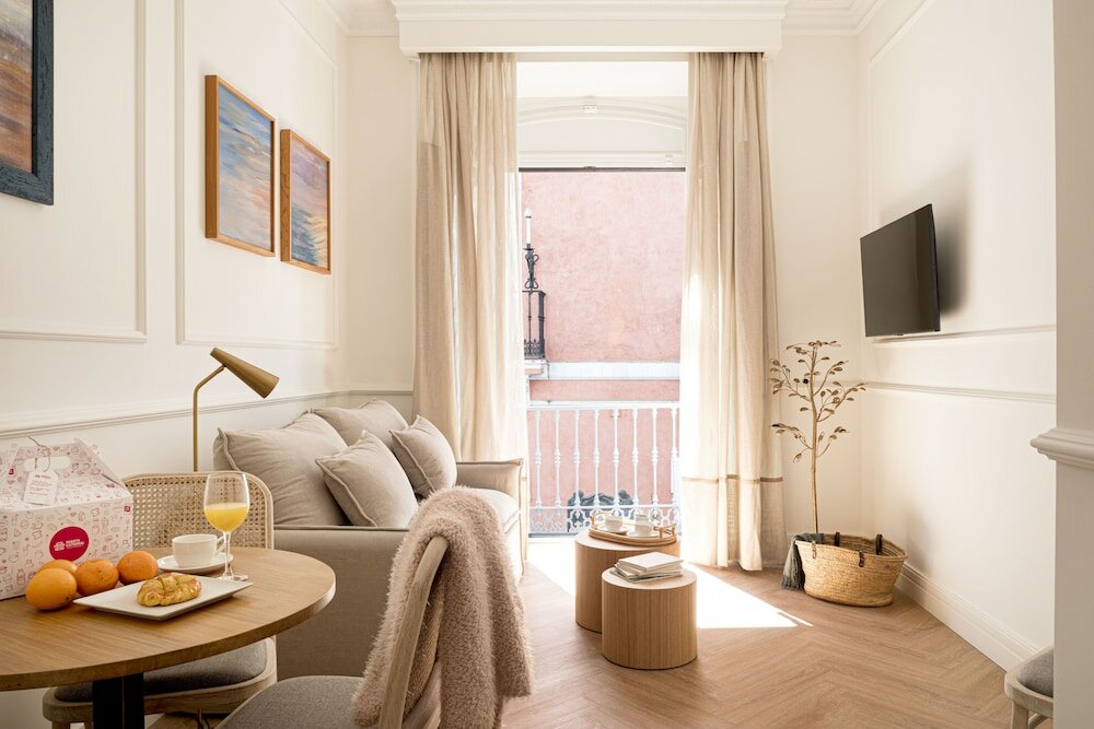 Фото Mylu Suites by Puerta Catedral