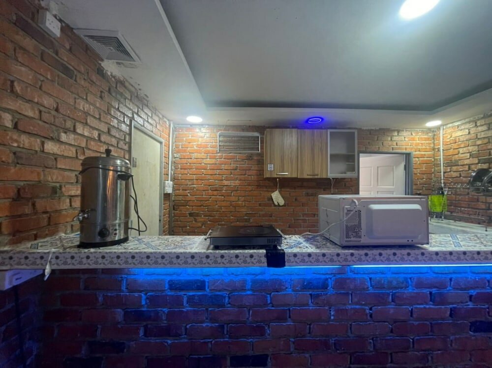 Фото Oyo Home 90370 D'tampi Homestay