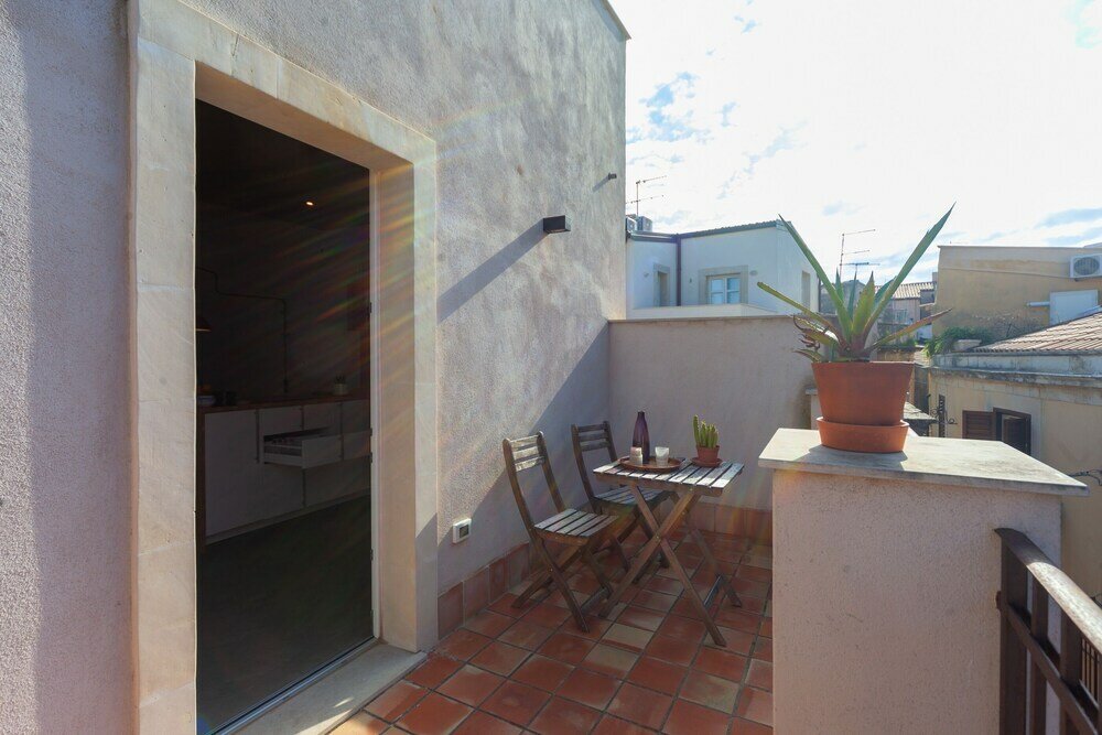 Фото Mercato di Ortigia Apartments