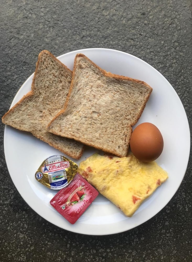 Фото The Sarining Hotel