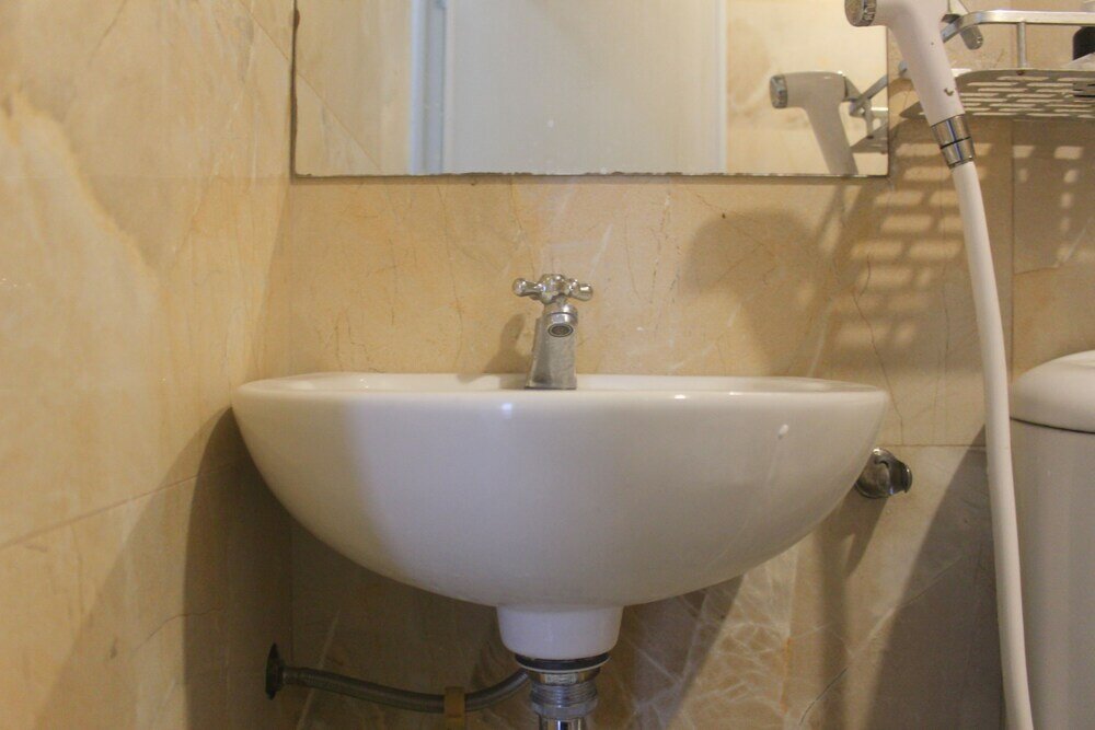 Фото Simple And Homey 2Br Apartment At Grand Asia Afrika