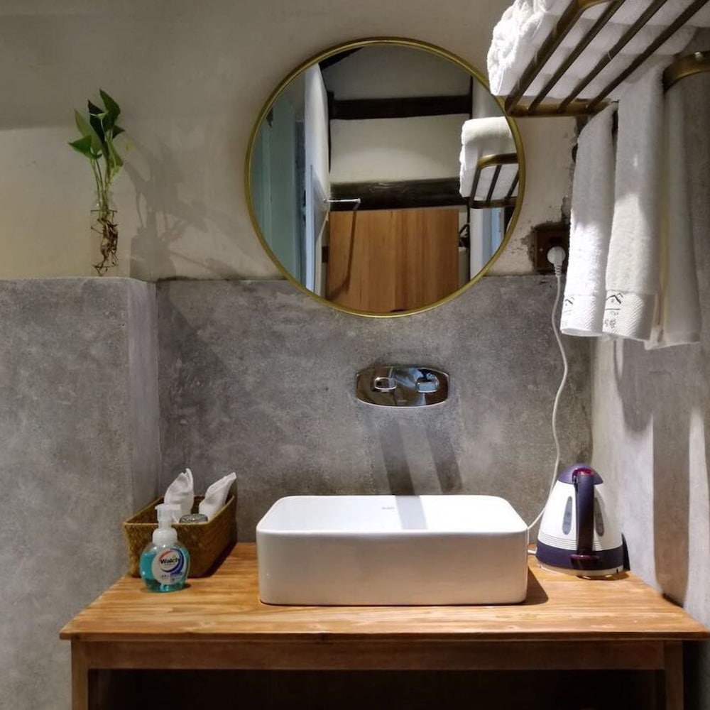 Фото Xiaochaguniang minsu